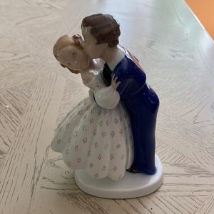 Youthful Boldness, Boy stealing a kiss from Girl, Bing & Grondahl figurine 2162